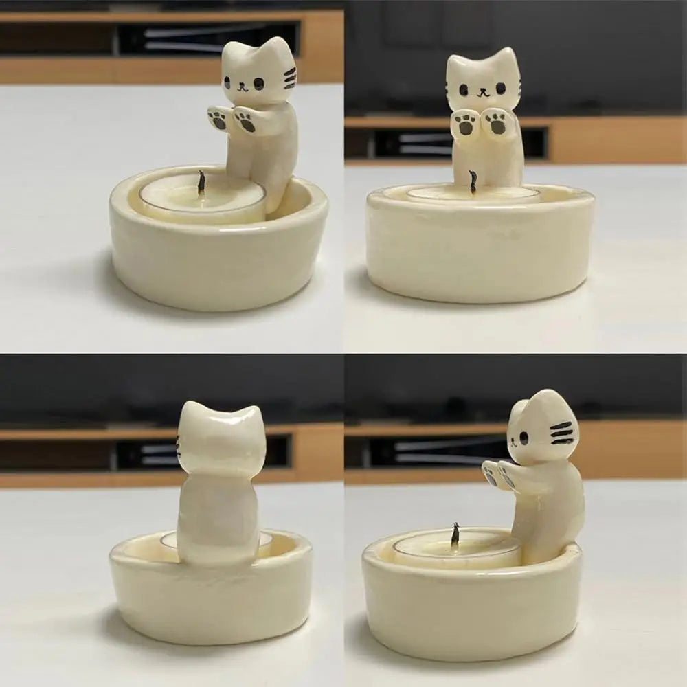 Kitten Candle Holder Warming Its Paws at $9.97 from Odditygadget