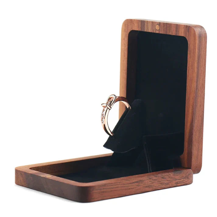 Lovely wooden rotating ring box from Odditygadget at $11.97