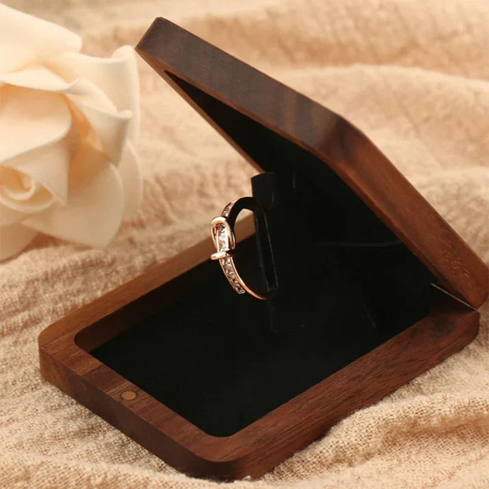 Lovely wooden rotating ring box from Odditygadget at $11.97