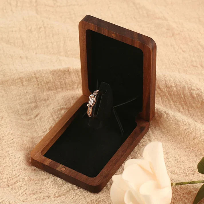 Lovely wooden rotating ring box from Odditygadget at $11.97