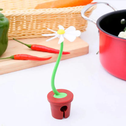 Cute Daisy Pot Overflow Protector Lifter from Odditygadget at $8.97