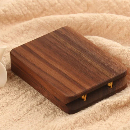 Lovely wooden rotating ring box from Odditygadget at $11.97