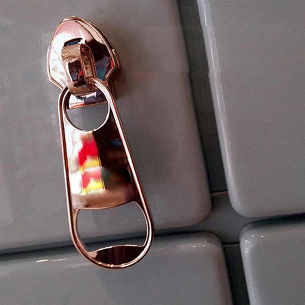 Magnetic Zipper Bottle Opener from Odditygadget at $19.97