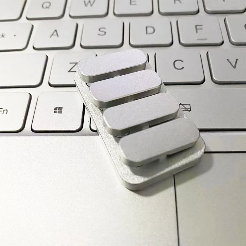 Piano Keys Fidget Clicker Slider Metal EDC Fidget Toy from Odditygadget at $14.97