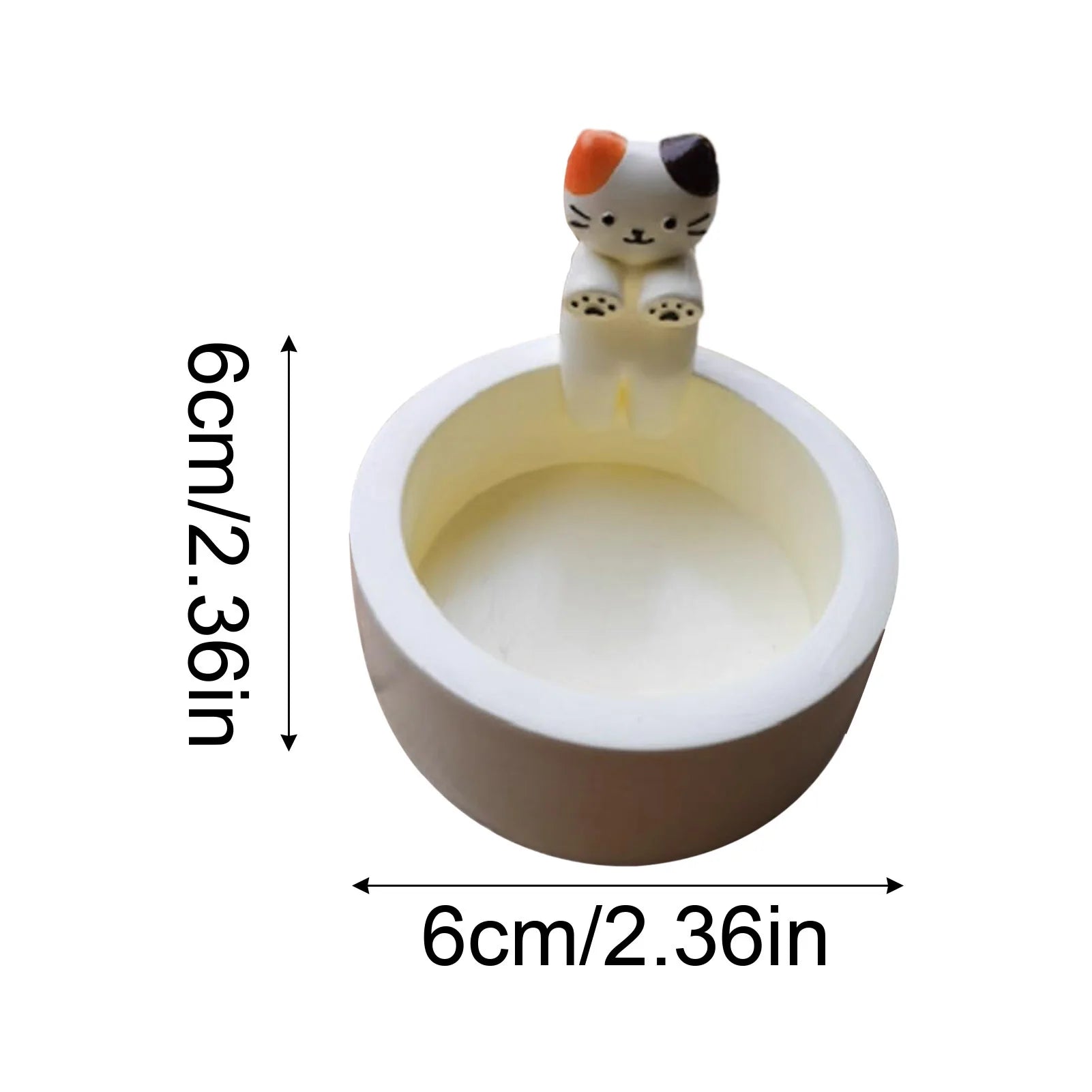 Kitten Candle Holder Warming Its Paws from odditygadget at $9.99